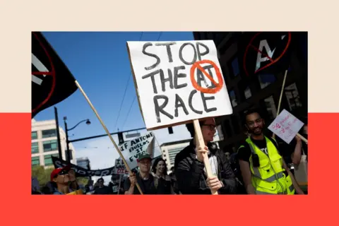 Reuters A person marches at an anti-AI protest with a sign that reads "Stop the AI race"