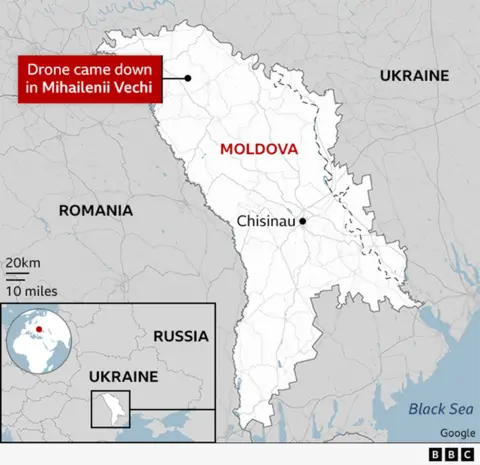 Map of Moldova showing the location of Mihailenii Vechi near the country's north-western border with Romania. A callout marks the spot where a drone came down. The capital, Chisinau, is labelled in the south-central part of the country. Neighbouring Romania and Ukraine are shown, along with an inset map locating Moldova in eastern Europe near the Black Sea.
