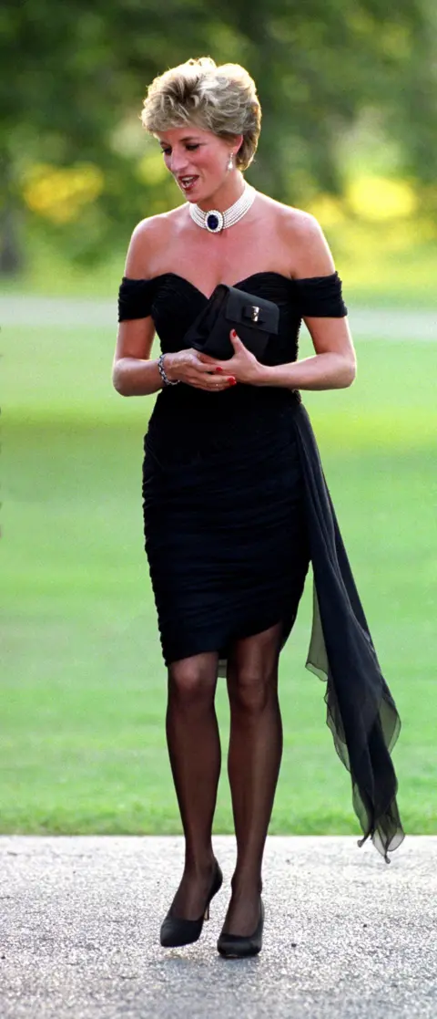 Martin Keene/PA Wire Princess Diana arriving at the Serpentine Gallery wearing a dress designed by Christina Stambolian dress. The famous "revenge dress" worn worn by Diana during a Vanity Fair fundraising dinner at the Serpentine Gallery in London, on the same night her then-husband the Prince of Wales publicly admitted his infidelity on national television