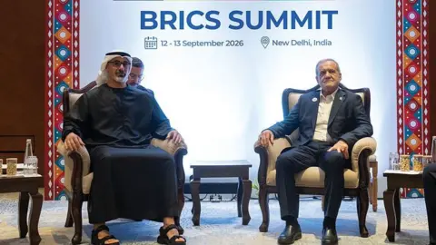 Getty Images Iranian President Masoud Pezeshkian meets with Abu Dhabi Crown Prince Sheikh Khaled bin Mohamed bin Zayed Al Nahyan of the United Arab Emirates (UAE) on the sidelines of the 18th BRICS Summit held in New Delhi, India on September 12, 2026