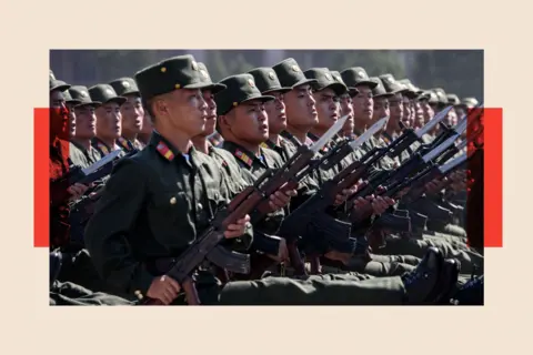 AFP via Getty Images Korean People's Army (KPA) soldiers march during a mass rally