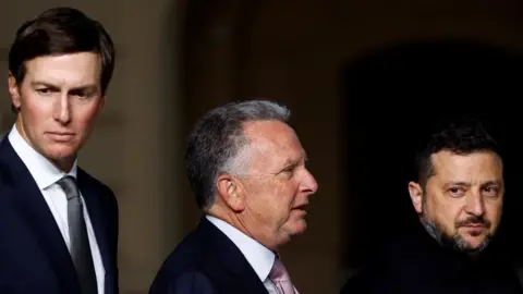 Reuters Ukraine's President Volodymyr Zelenskiy, U.S. Special Envoy Steve Witkoff and Jared Kushner, U.S. President Donald Trump's son-in-law, after a joint news conference, 