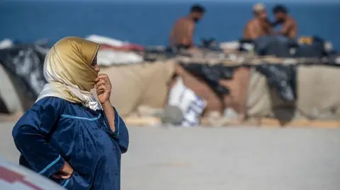 Europa Press via Getty Image A migrant living on Trampolin Beach, on 31 August, 2026 in Ceuta, Spain.