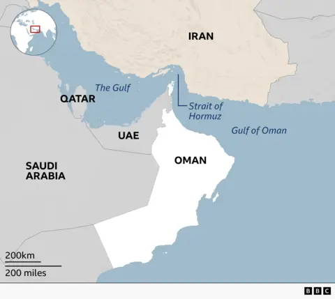 A map of the  Gulf region shows the Strait of Hormuz, the narrow waterway between Iran and Oman that connects the Gulf to the Gulf of Oman. Qatar, the United Arab Emirates (UAE) Saudi Arabia and Oman are labelled, with the strait highlighted at the entrance to the Gulf.
