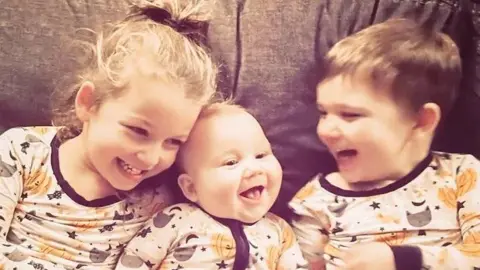Patti Anne Photography Clancy's children Cora Clancy (left), 8-month-old Callan (centre) and three-year-old Dawson