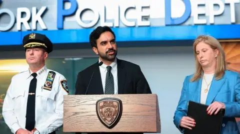 Reuters New York City Mayor Zohran Mamdani speaks next to NYPD Commissioner Jessica Tisch during a press conference at the scene of an officer-involved shooting, in Times Square, New York City, U.S., August 31, 2026